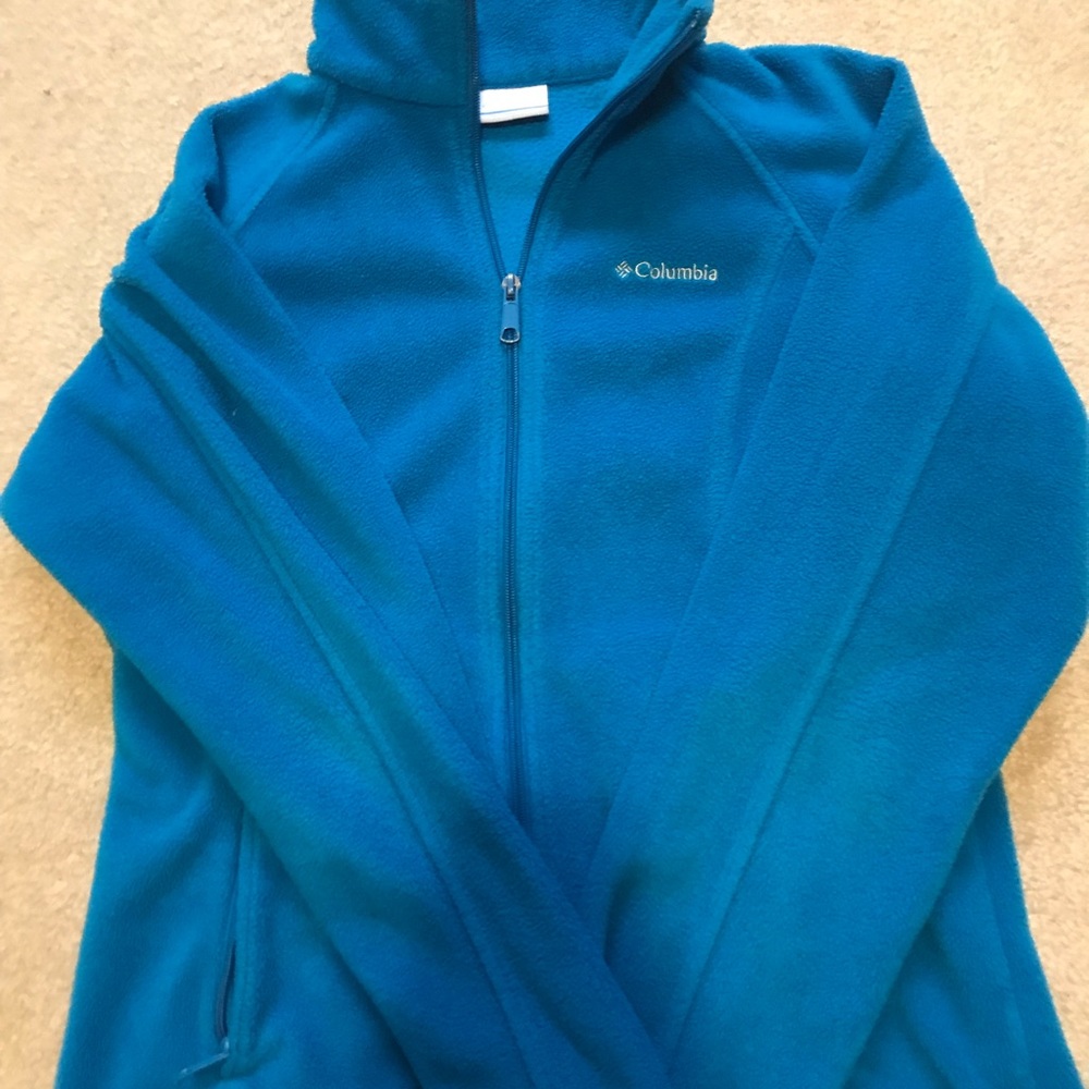 woman’s blue Columbia zip up